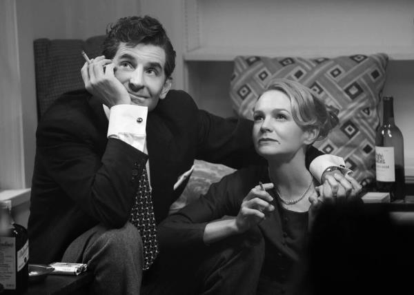 Bradley Cooper as Leonard Bernstein in "Maestro." Carley Mulligan co-stars as actress Felicia Montealegre, Bernstein's second wife.